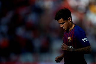 Barcelona's Coutinho out for 3 months after knee surgery
