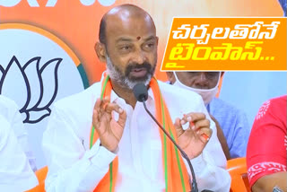 bjp leader bandi sanjay fire on cm kcr for promotions to employees