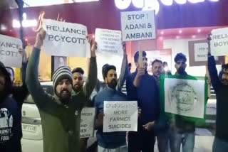 Farmers protest outside reliance store ambala