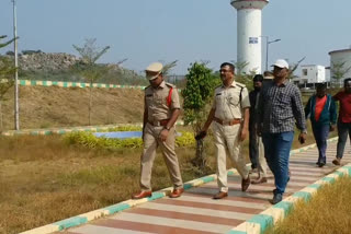 Officials repairing a Buddha statue in Tekkali