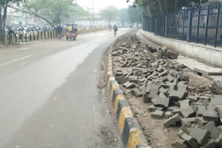 Passengers disturbed by uprooted tiles on dwarka metro station