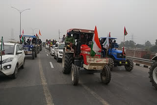 Farmers demonstrate power by taking out tractor rally at singhu border