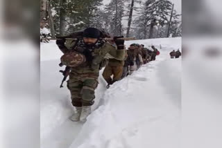 Army personnel in Sopore carried a woman and her newborn on a stretcher about 3.5 km