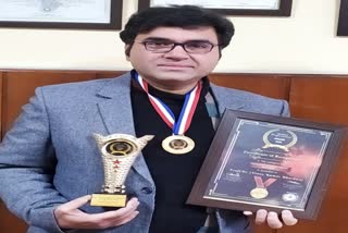 dental-college-hod-received-public-health-dentistry-award-2020