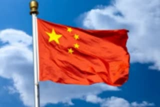 China says COVID shots will be free in country