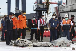 Body parts, debris found after Indonesia plane crash