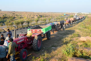 Vehicles parked on the bypass road in the city of Kurnool