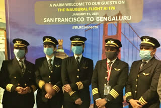 air indias all women cockpit crew takes land, air indias all women cockpit crew takes land on historic 17 hour flight, air indias all women cockpit crew takes land in bengaluru, Air indias flight land, Air indias flight land in KIA, ಮಹಿಳಾ ಸಾರಥ್ಯದಲ್ಲಿ ಸ್ಯಾನ್ ಫ್ರಾನ್ಸಿಸ್ಕೊನಿಂದ ಬೆಂಗಳೂರಿಗೆ ಬಂದ ಲೋಹದ ಹಕ್ಕಿ, ಏರ್‌ ಇಂಡಿಯಾ ಮಹಿಳಾ ಪೈಲಟ್​ಗಳಿಂದ ಮಹತ್ಸಾಧನೆ, ಸ್ಯಾನ್ ಫ್ರಾನ್ಸಿಸ್ಕೊನಿಂದ ಬೆಂಗಳೂರಿಗೆ ಆಗಮಿಸಿದ ವಿಮಾನ, ಸ್ಯಾನ್ ಫ್ರಾನ್ಸಿಸ್ಕೊನಿಂದ ಬೆಂಗಳೂರಿಗೆ ಆಗಮಿಸಿದ ವಿಮಾನ ಸುದ್ದಿ,