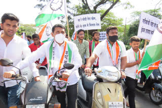 NCP's "push the car"agitation against petrol and diesel price hike.