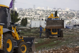 israel announces new settlements, risking biden's anger