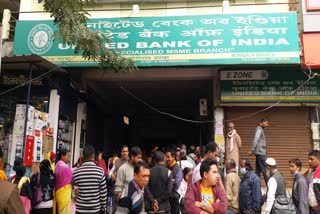 ubi customer lines outside ATM at morigaon