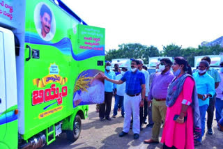 Kurnool Collector inspecting vehicles prepared for distribution of ration rice