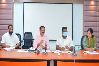 director of municipal commissioner and  director of administration is review on gove programs in warangal