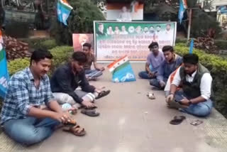 On Youth Day the Congress sat under the Gandhi statue and polished the shoes in angul