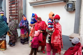 Women waiting outside dispensary