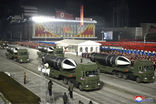 N Korea holds huge military parade as Kim vows nuclear might