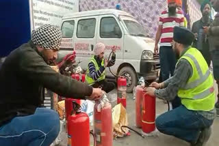 punjab-based-organization-sent-500-fire-extinguisher-cylinders-on-the-singhu-border