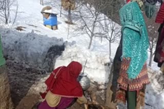 In freezing temperature, Kokernag residents use snow for drinking water