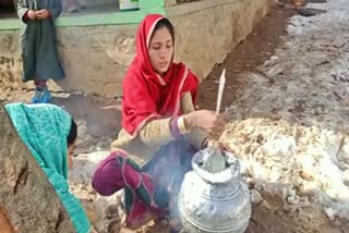 Kokernag residents use snow for drinking water