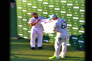 team india gifted signed jersey to nathan lyon