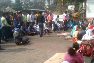 workers demonstrated with plate at the company gate in chaibasa