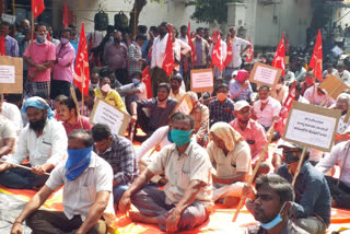 krishnapatnam port workers protest at nellore collectorate