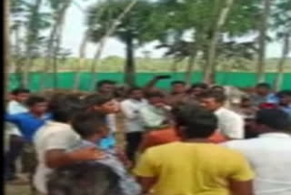 Four youth tied to tree