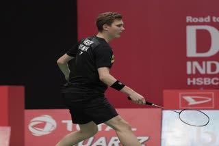 Viktor Axelsen breaks his racket on match point