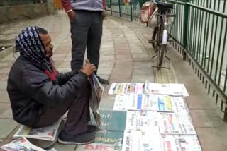 Newspaper seller