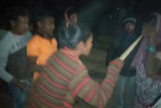 Villagers beaten a woman as child lifter