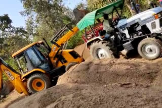 tehsildar confiscates sand stored illegally at baghandi ghat