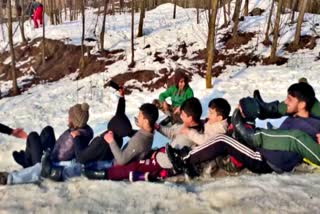 Kashmiri Kids enjoy snow riding