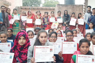 Certificates of distributed to girls in bhikkanpur village ghaziabad