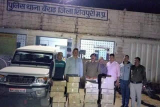 25 cases of illegal liquor confiscated with Bolero van