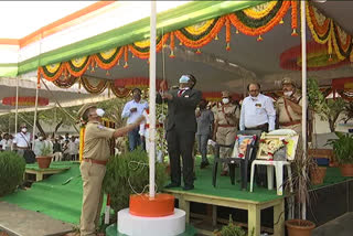 Collector Rajiv Gandhi at the unveiling of the national flag