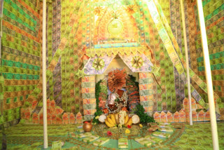 Decoration with currency notes to the village goddess in Kadiyapulanka, East Godavari district