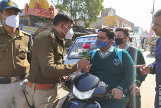 giving rose to follow traffic rules