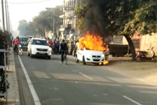 fire in car charhi dadri