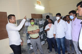 Collector inspecting security arrangements at EVMs godown