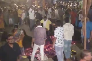 Devotees walk on fire