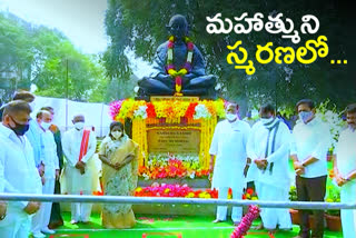 governor and ministers pay tribute to mahatma gandhi at bapu ghat