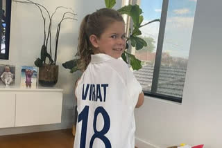 We have one very happy girl here: Warner's daughter elated after getting Kohli's jersey