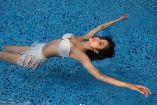 mouni-roy-shared-some-stunning-pictures-of-herself-chilling-in-a-pool