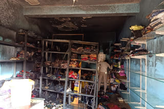 fire from electrical short circuit to clothing store