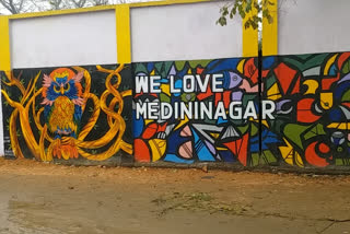 Painting of owl in tag line of cleanliness drive of Medininagar Municipal Corporation