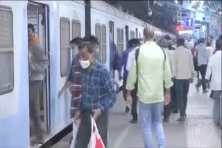 Passengers arrive at Dadar railway station