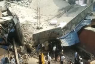 Warehouse building collapses