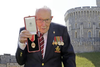 Tom Moore, UK veteran who walked for NHS, dies at 100