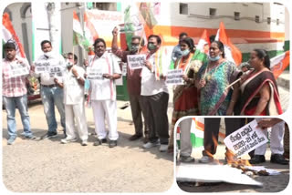 congress leaders protest against budget at vijayawada