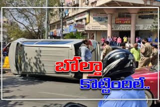 An Innova vehicle collided with a road divider in Hyderabad and overturned